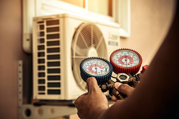 Professional Air Conditioning Service technician working in Sulphur Springs, IN
